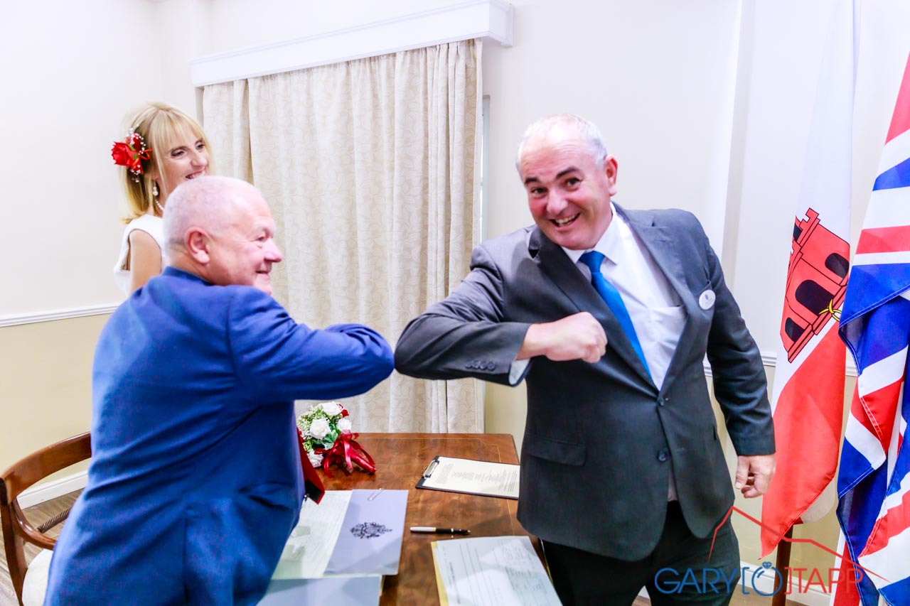 The Registry Office Gibraltar inside ceremony room with Adrian the registrar