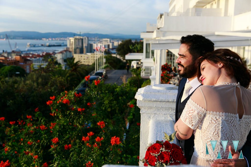 Couple overlooking the bay at The Rock Hotel Gibraltar