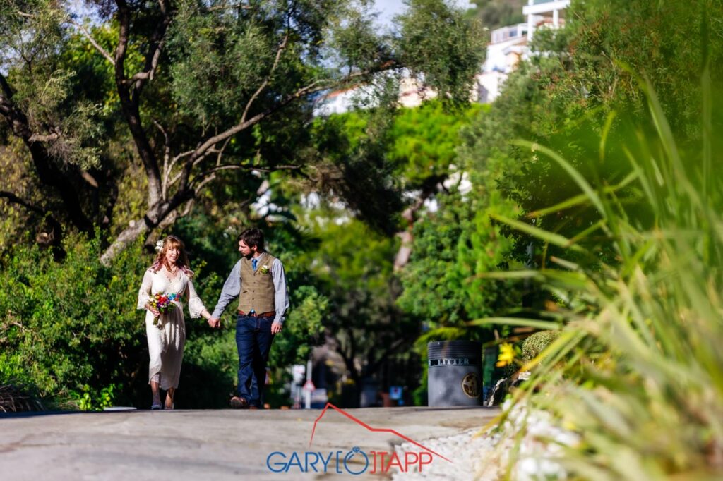 Wedding couple holding hands The Botanical Gardens Gibraltar