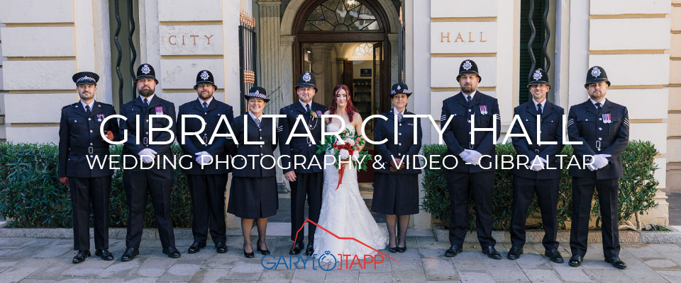 Gibraltar City Hall Wedding Photographer 1 Bride and grrom outside Gibraltar City Hall for formal wedding photo