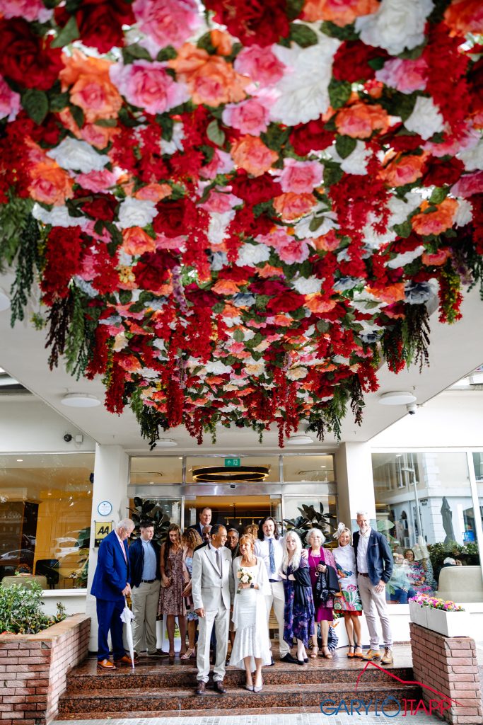 The Eliott Hotel Wedding Photographer 2 Wedding group shot outside the Eliott Hotel Wedding location in Gibraltar