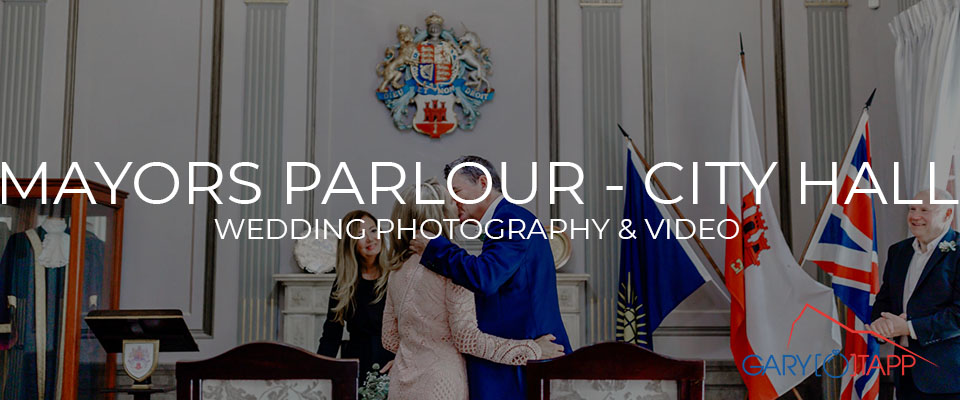 Bride and groom in the Mayors Parlour, City Hall Gibraltar wedding venue